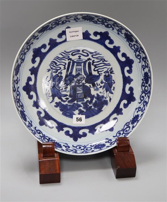 A Chinese blue and white dish, in Kangxi style, wood stand diameter 34cm